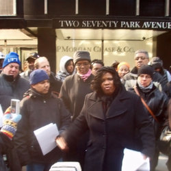 Rec. Sec. Benita Johnson stands with protesters outside of JPM Chase corporate offices