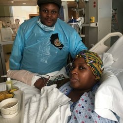 Monique Brathwaite with Union Rep Duvet Williams in her hospital bed