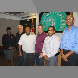 Top Officers Swore in John Chiarello (in maroon shirt) and Duvet Williams of MOW