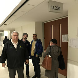 Local 100 President Tony Utano and elected officers leaving the Bronx courtroom Monday