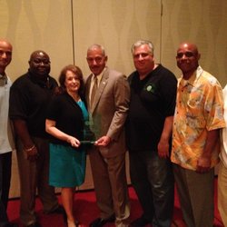 Angel, center with Sonia Ivany. At her right is TWU International VP Curtis Tate; at Angel's left is Local 100 VP of MOW, Tony Utano. Next to Tony is Local 100 Staffer Jesse Mendoza.