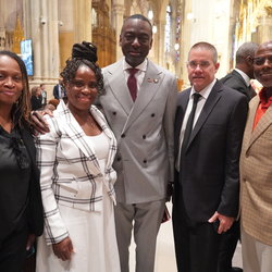 Councilmember Yusef Salaam stands with Union leaders at the funeral for Charles Rangel