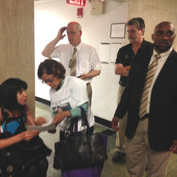 In court before the brief hearing, (l-r), standing, William Pena's widow, Nancy Rodriguez, MTA CTO Stephen Vidal, OA VP Brian Clarke, and OA Div 1 Chair Richard Davis