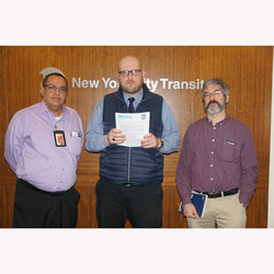 RTO Officers (l-r) Raul Lugo, VP Eric Loegel, and Zach Arcidiacono mark the end of the "rubber room."