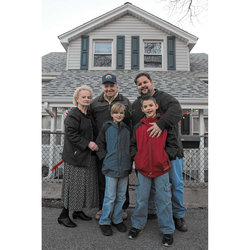 President John Samuelsen, with parents Warren and Theresa Samuelsen and sons in this 2012 photo in front of house bought by John’s grandmother, Mary McMahon, when she came from the north of Ireland in the 1920’s in Gerritsen Beach, Brooklyn.