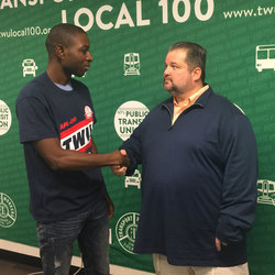 Pres. Samuelsen with Pedicab Driver Ibrahim Barrie, who hails from Sierra Leone