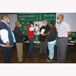 Pres. Utano salutes Brother Whichard with a fist bump after he swore him into office under the Union Constitution